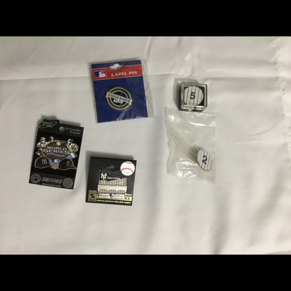 5- NY Yankee pins- still in packaging..